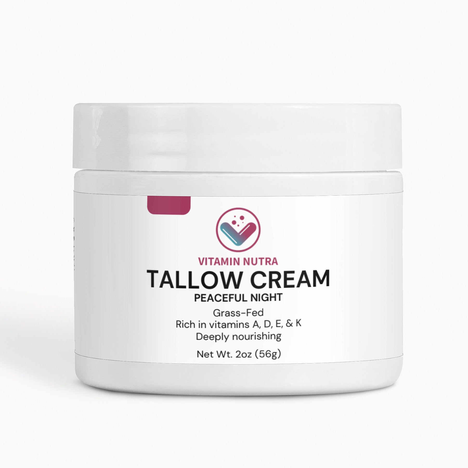 Woman applying Tallow Cream Peaceful Night for deep facial hydration.